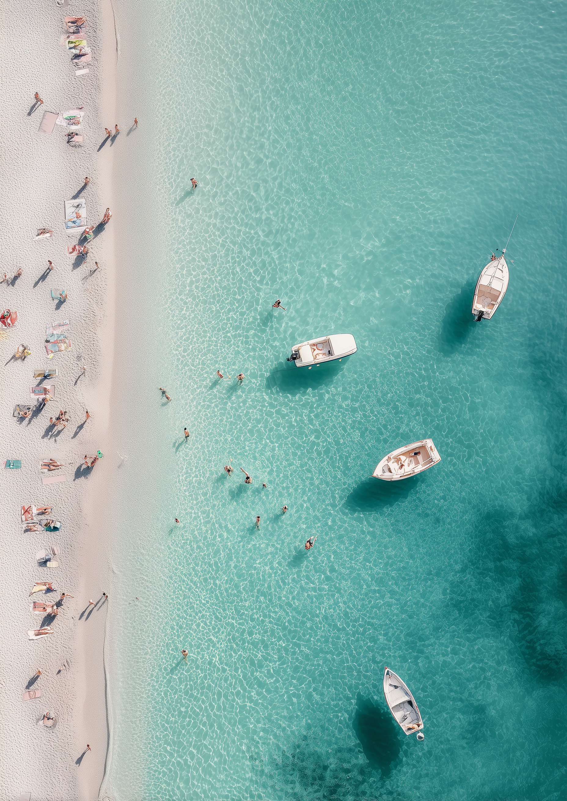 A2 artwork of an Italian beach with soft sea tones and sun-drenched rocks. Artwork example.
